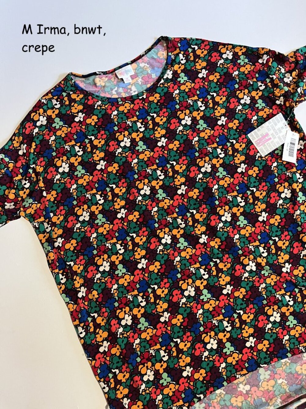 Medium Lularoe Irma oversized tunic top, colorful round flowers, crepe